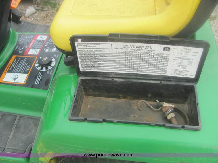 image for item 6169 2001 John Deere 325 lawn mower