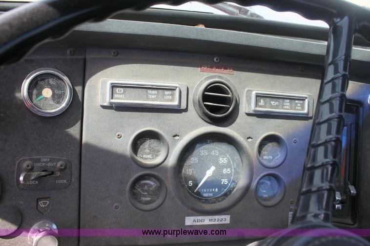 image for item 6282 1988 Ford T8000 rollback truck