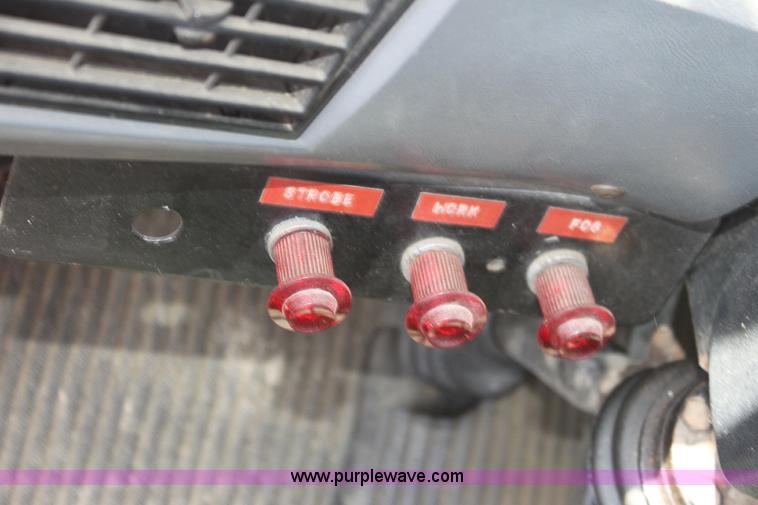 image for item 6282 1988 Ford T8000 rollback truck