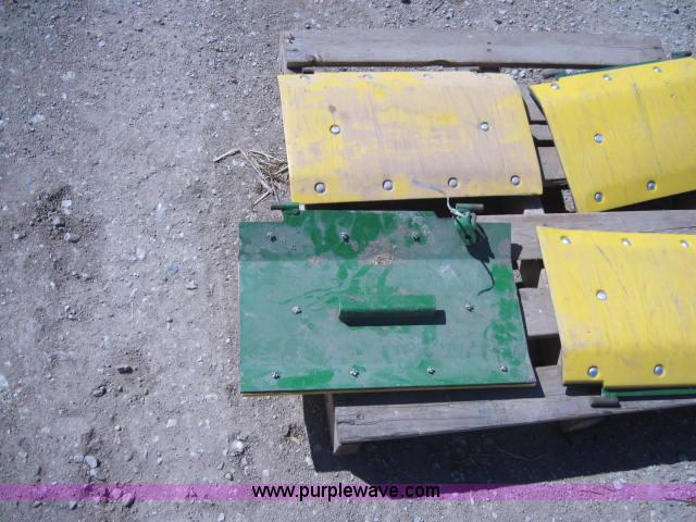 image for item 1966 (4) John Deere skid shoes