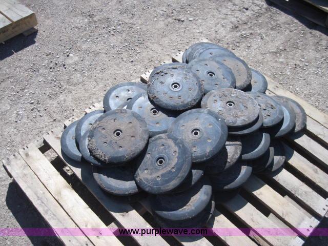 image for item 1967 Approximately 30 John Deere planter closing wheels