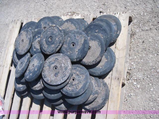 image for item 1967 Approximately 30 John Deere planter closing wheels