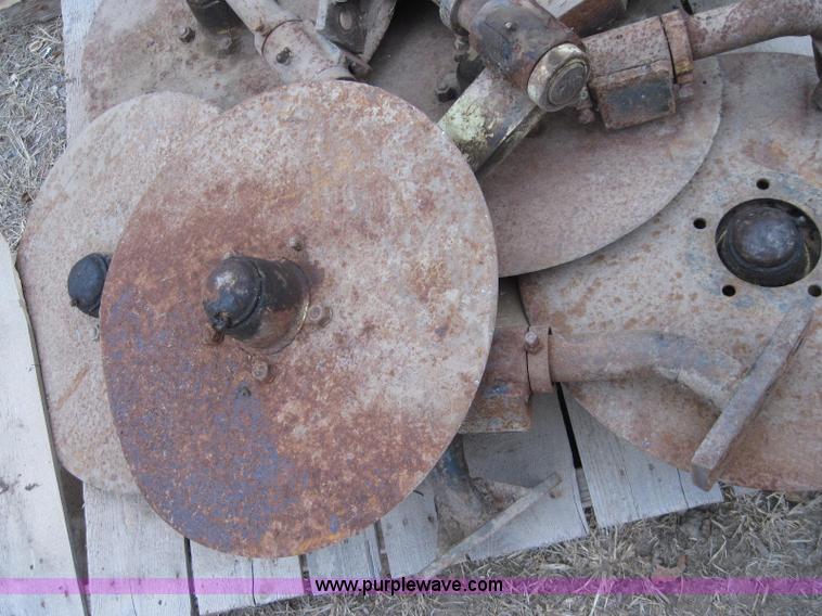 image for item 1993 Approximately 7 Flex King under-cutter 21.5" coulters with mounts