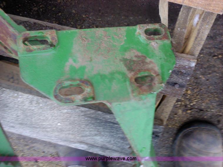 image for item 2038 (12) John Deere unit mount coulters