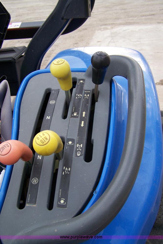 image for item 7292 2005 New Holland TC29D tractor with loader and tiller