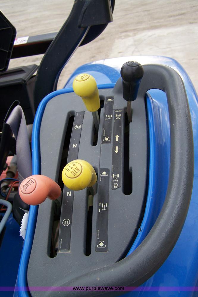 image for item 7292 2005 New Holland TC29D tractor with loader and tiller