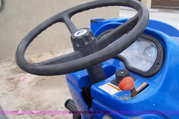 image for item 7292 2005 New Holland TC29D tractor with loader and tiller