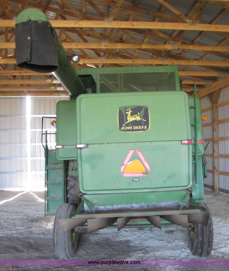 image for item 8660 1979 John Deere 7720 combine and header