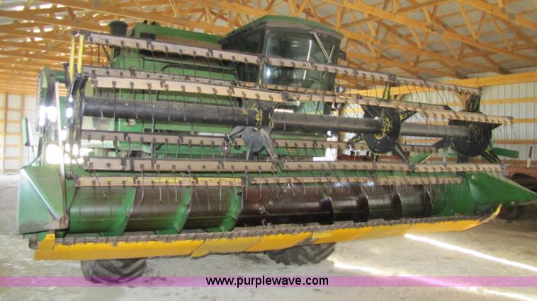image for item 8660 1979 John Deere 7720 combine and header