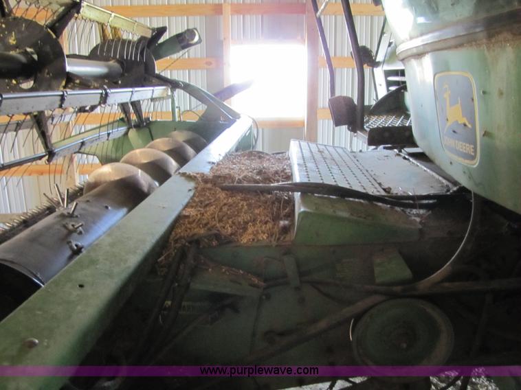 image for item 8660 1979 John Deere 7720 combine and header