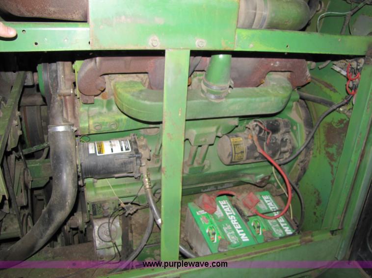 image for item 8660 1979 John Deere 7720 combine and header
