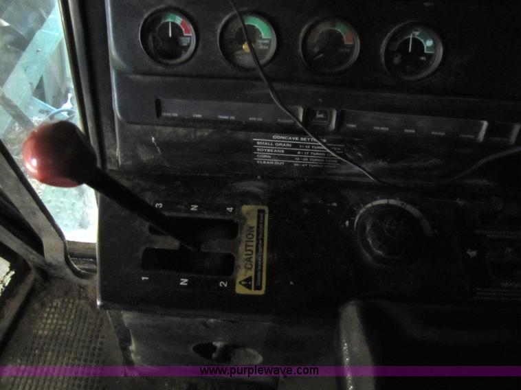 image for item 8660 1979 John Deere 7720 combine and header