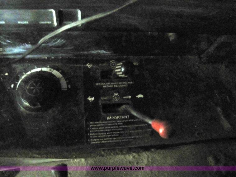 image for item 8660 1979 John Deere 7720 combine and header