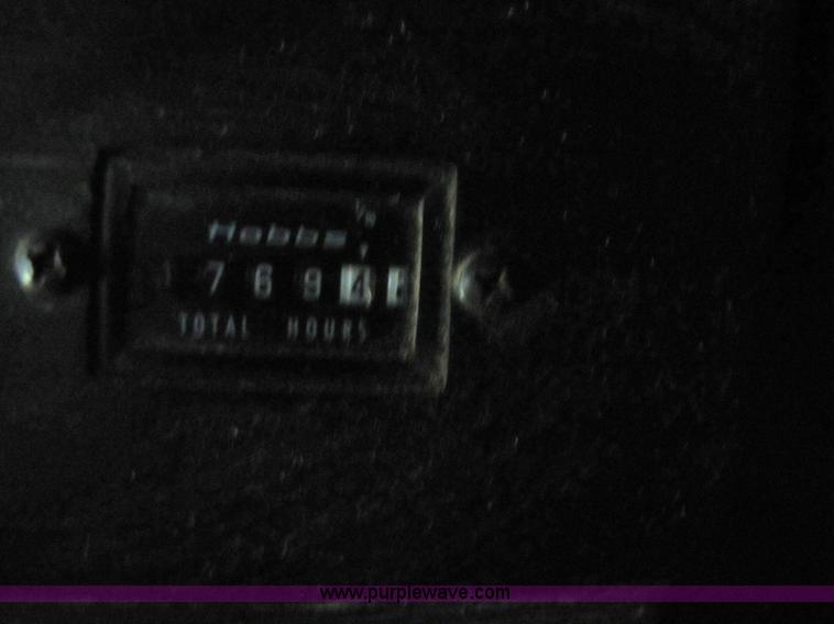 image for item 8660 1979 John Deere 7720 combine and header