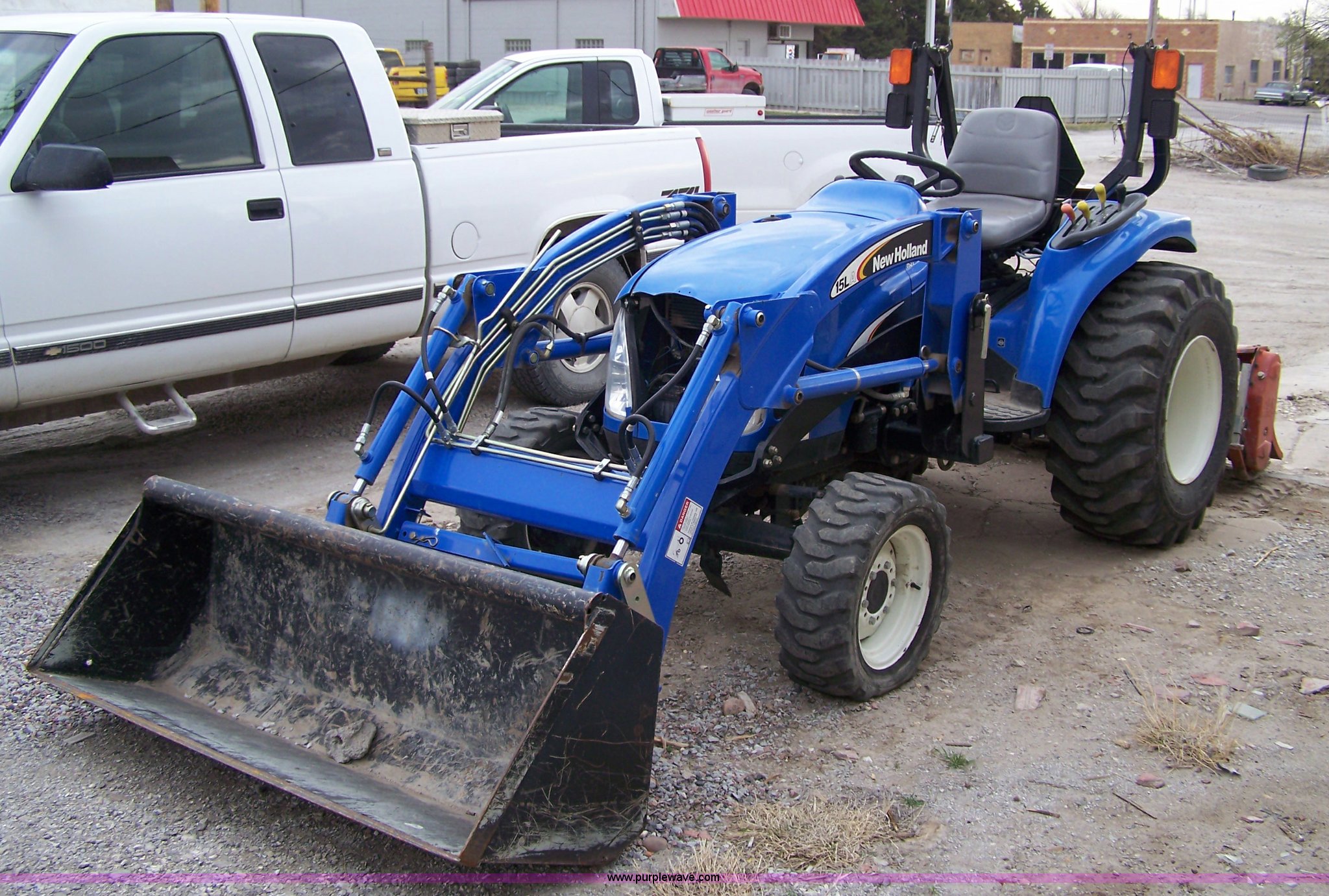 2005 New Holland TC29D tractor with loader and tiller in Plainville, KS