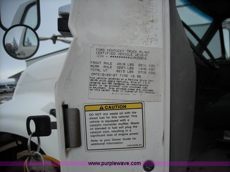 image for item 1001 1998 Ford F800 truck with CME drill attachment