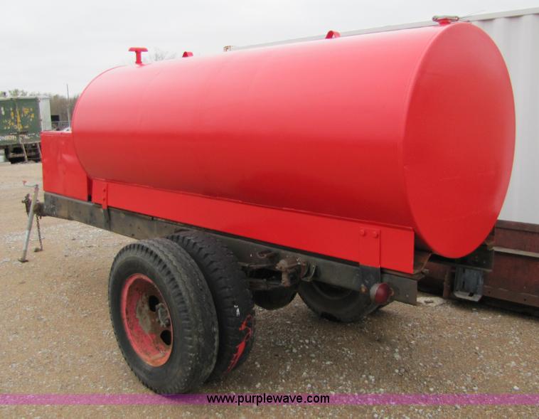 image for item 2464 1,000 gallon fuel tank on shop built trailer