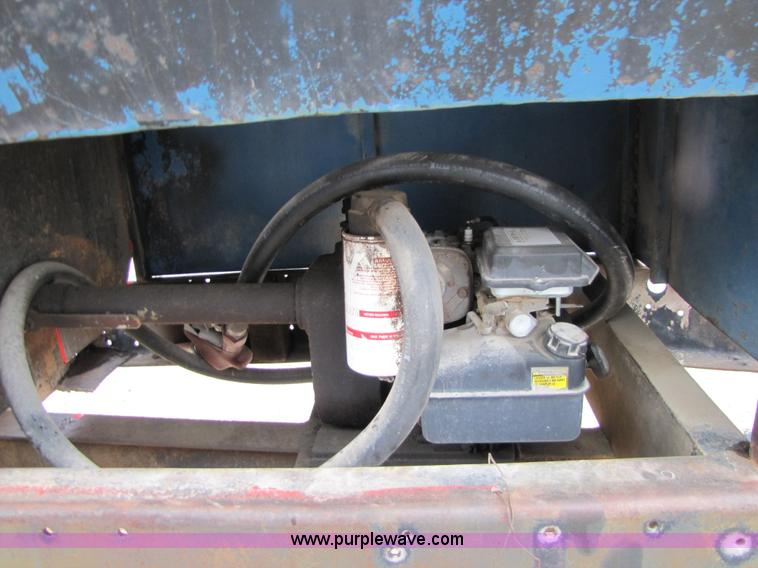 image for item 2464 1,000 gallon fuel tank on shop built trailer