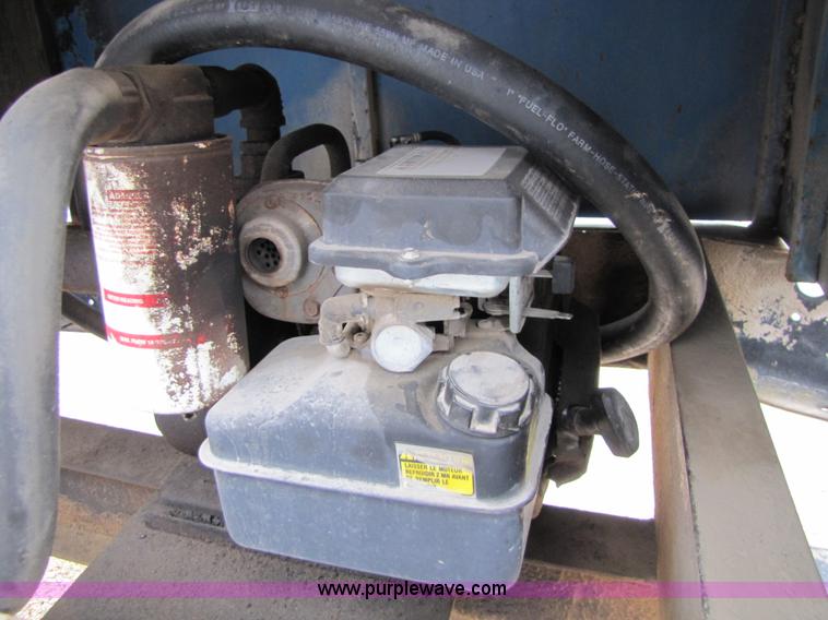 image for item 2464 1,000 gallon fuel tank on shop built trailer