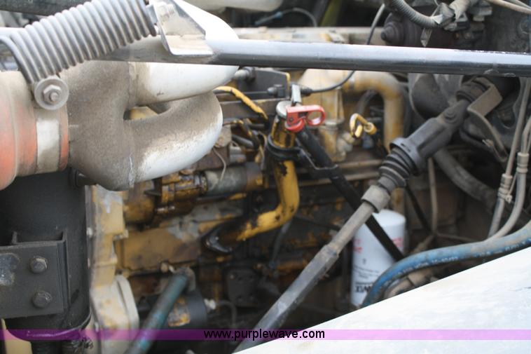 image for item 4823 1995 GMC Topkick Lo-profile flatbed truck