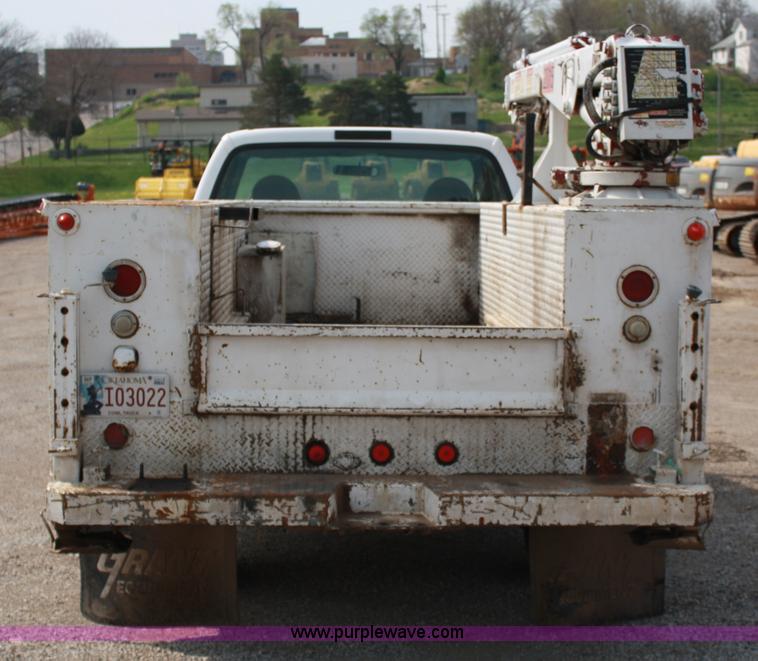 image for item 4907 1999 Ford F450 Super Duty pickup truck with service bed