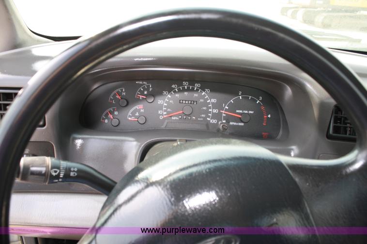 image for item 4907 1999 Ford F450 Super Duty pickup truck with service bed