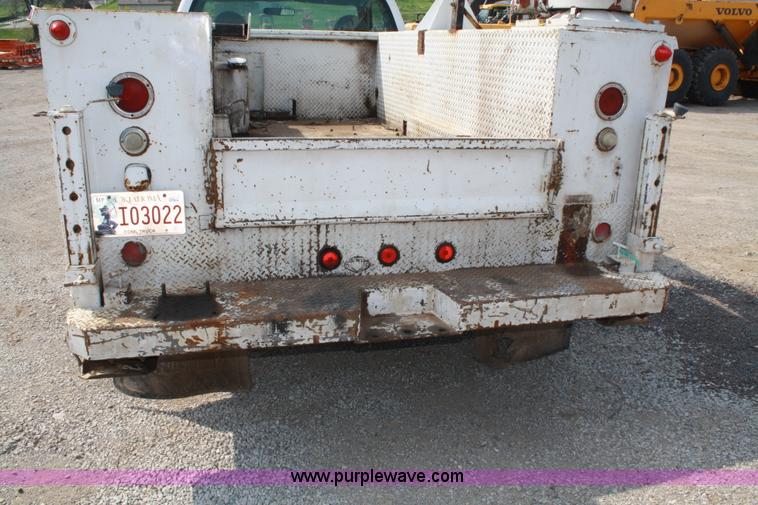 image for item 4907 1999 Ford F450 Super Duty pickup truck with service bed