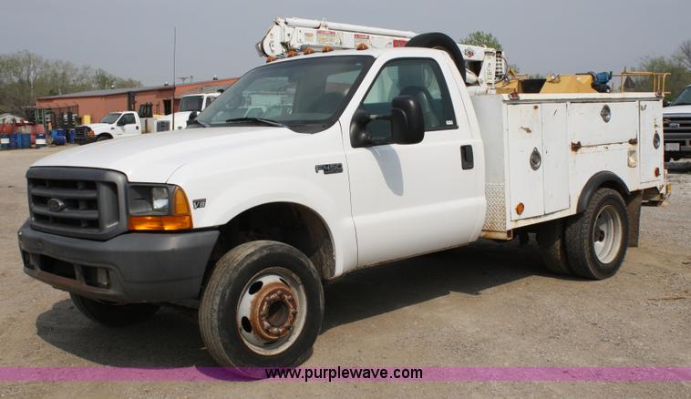 image for item 4909 1999 Ford F450 Super Duty pickup truck with service bed