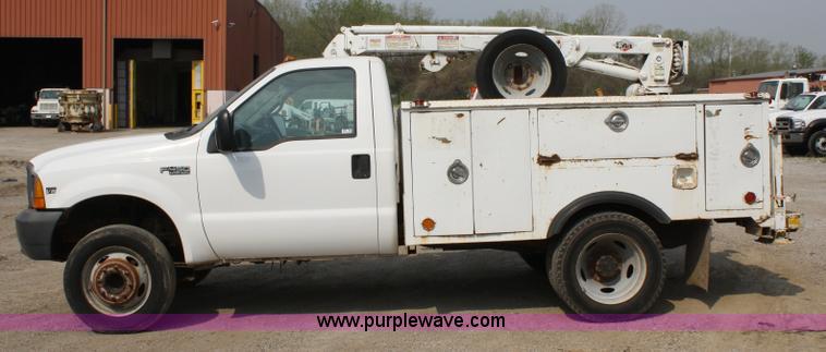 image for item 4909 1999 Ford F450 Super Duty pickup truck with service bed