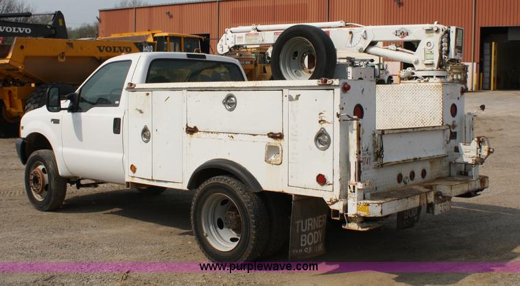 image for item 4909 1999 Ford F450 Super Duty pickup truck with service bed