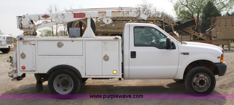 image for item 4909 1999 Ford F450 Super Duty pickup truck with service bed