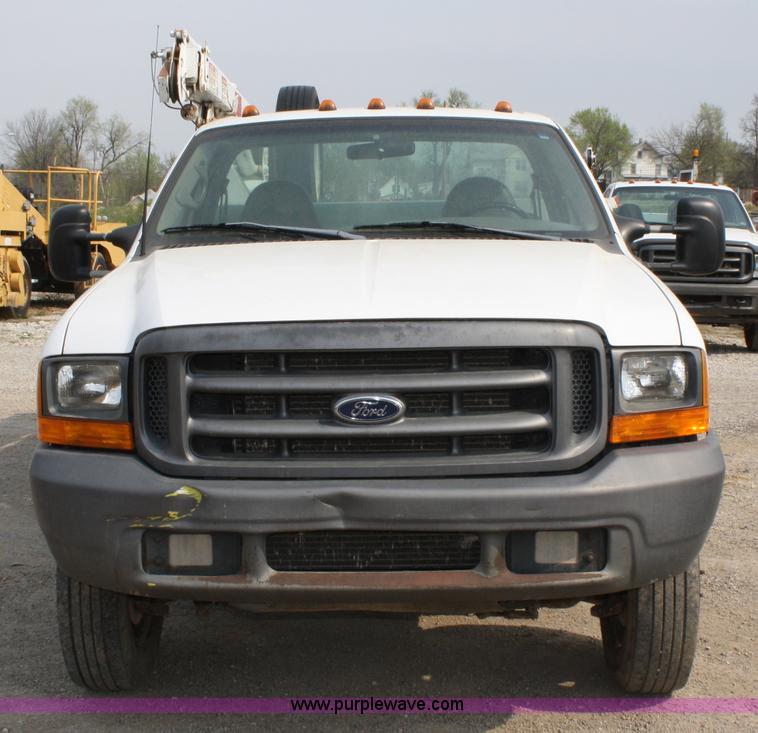 image for item 4909 1999 Ford F450 Super Duty pickup truck with service bed