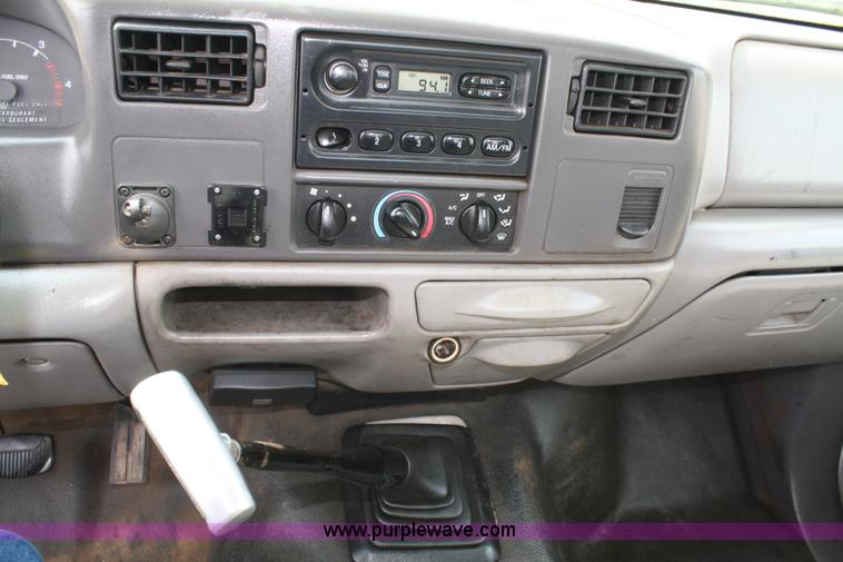 image for item 4909 1999 Ford F450 Super Duty pickup truck with service bed