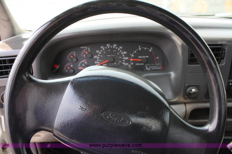 image for item 4909 1999 Ford F450 Super Duty pickup truck with service bed