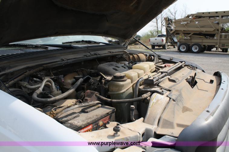 image for item 4909 1999 Ford F450 Super Duty pickup truck with service bed