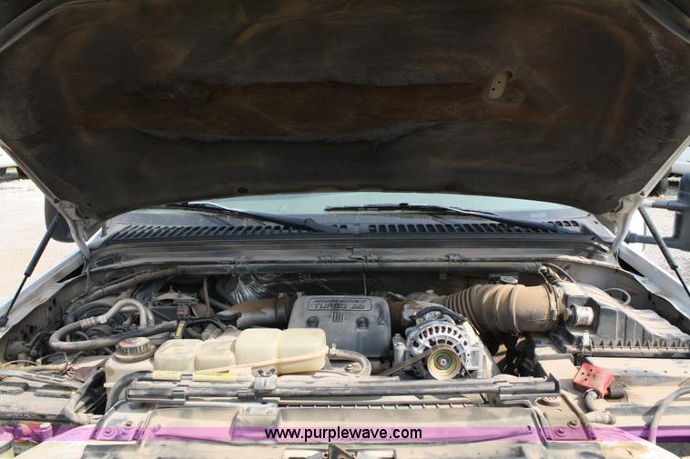 image for item 4909 1999 Ford F450 Super Duty pickup truck with service bed