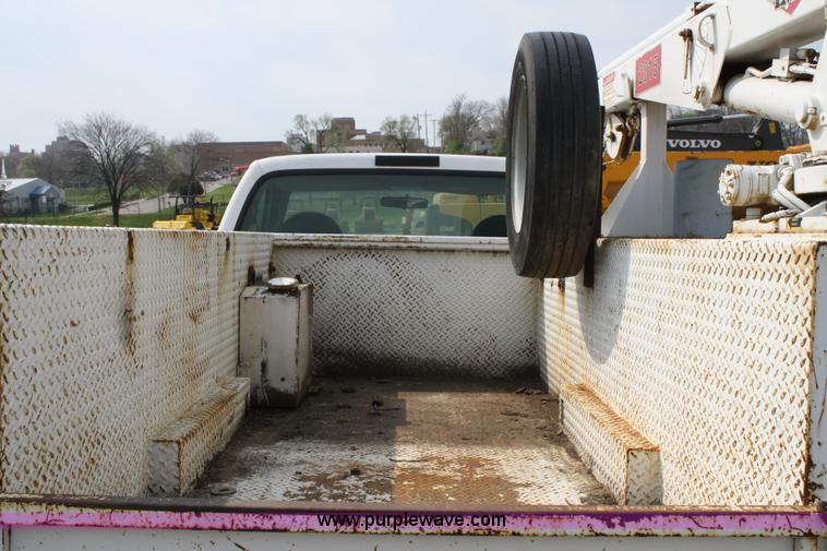 image for item 4909 1999 Ford F450 Super Duty pickup truck with service bed