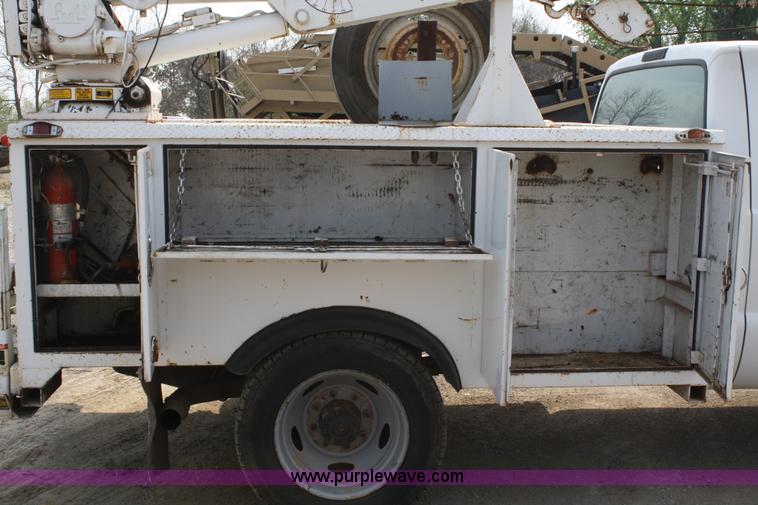 image for item 4909 1999 Ford F450 Super Duty pickup truck with service bed