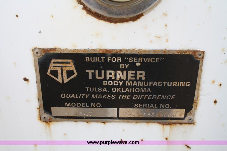 image for item 4909 1999 Ford F450 Super Duty pickup truck with service bed