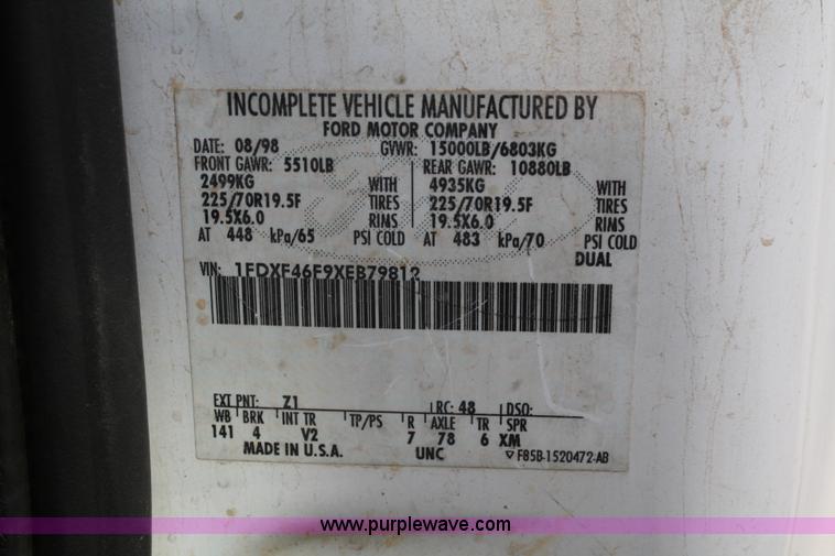 image for item 4909 1999 Ford F450 Super Duty pickup truck with service bed