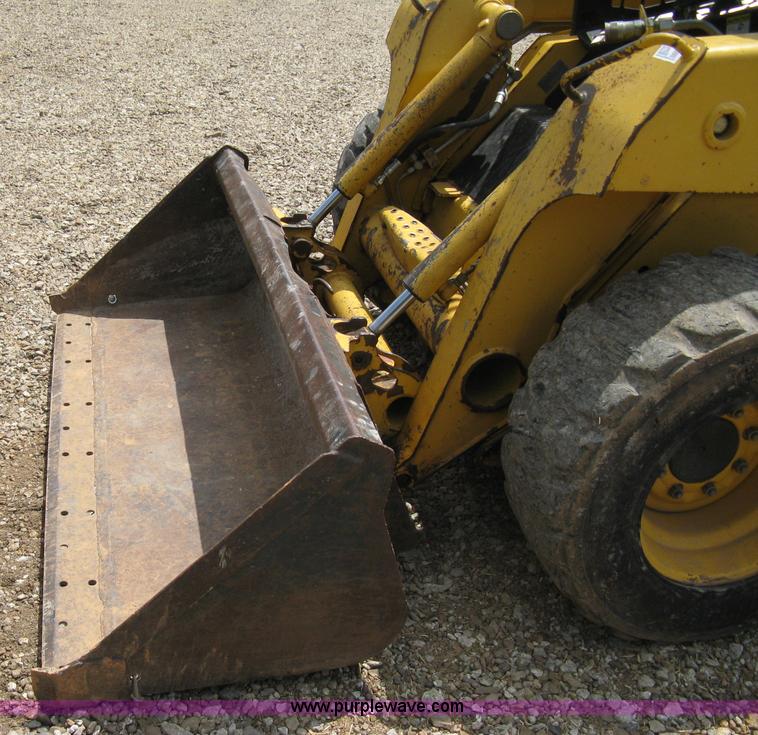 image for item 8136 John Deere 250 skid loader