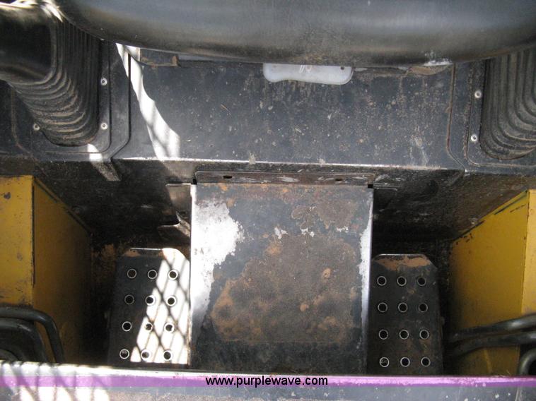 image for item 8136 John Deere 250 skid loader