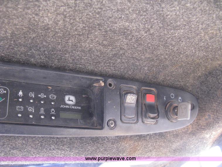 image for item 8136 John Deere 250 skid loader