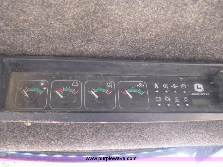 image for item 8136 John Deere 250 skid loader