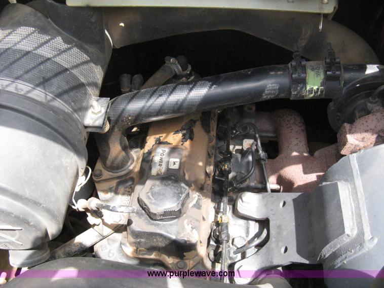 image for item 8136 John Deere 250 skid loader