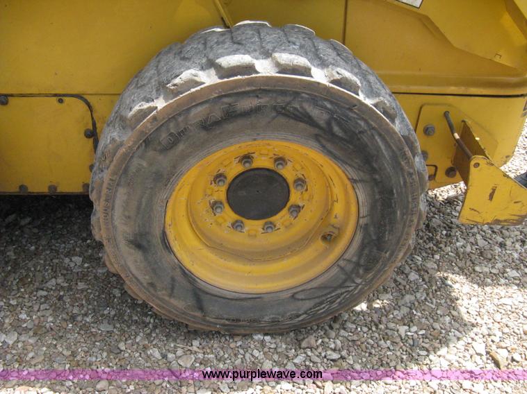 image for item 8136 John Deere 250 skid loader