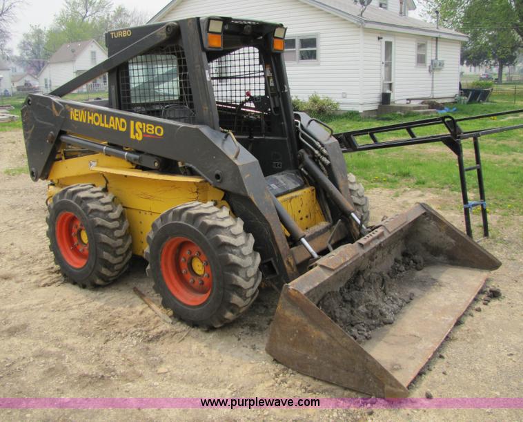 image for item 8671 New Holland LS180 skid steer