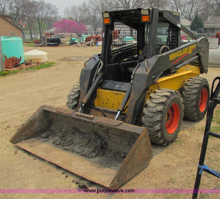 image for item 8671 New Holland LS180 skid steer