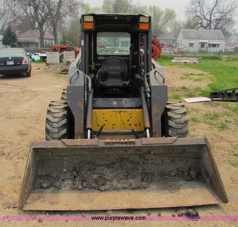 image for item 8671 New Holland LS180 skid steer