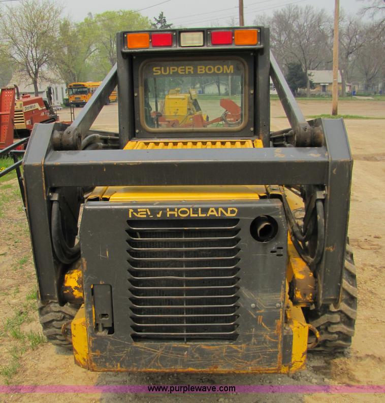 image for item 8671 New Holland LS180 skid steer